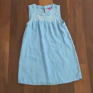 denim dress with white embroidery